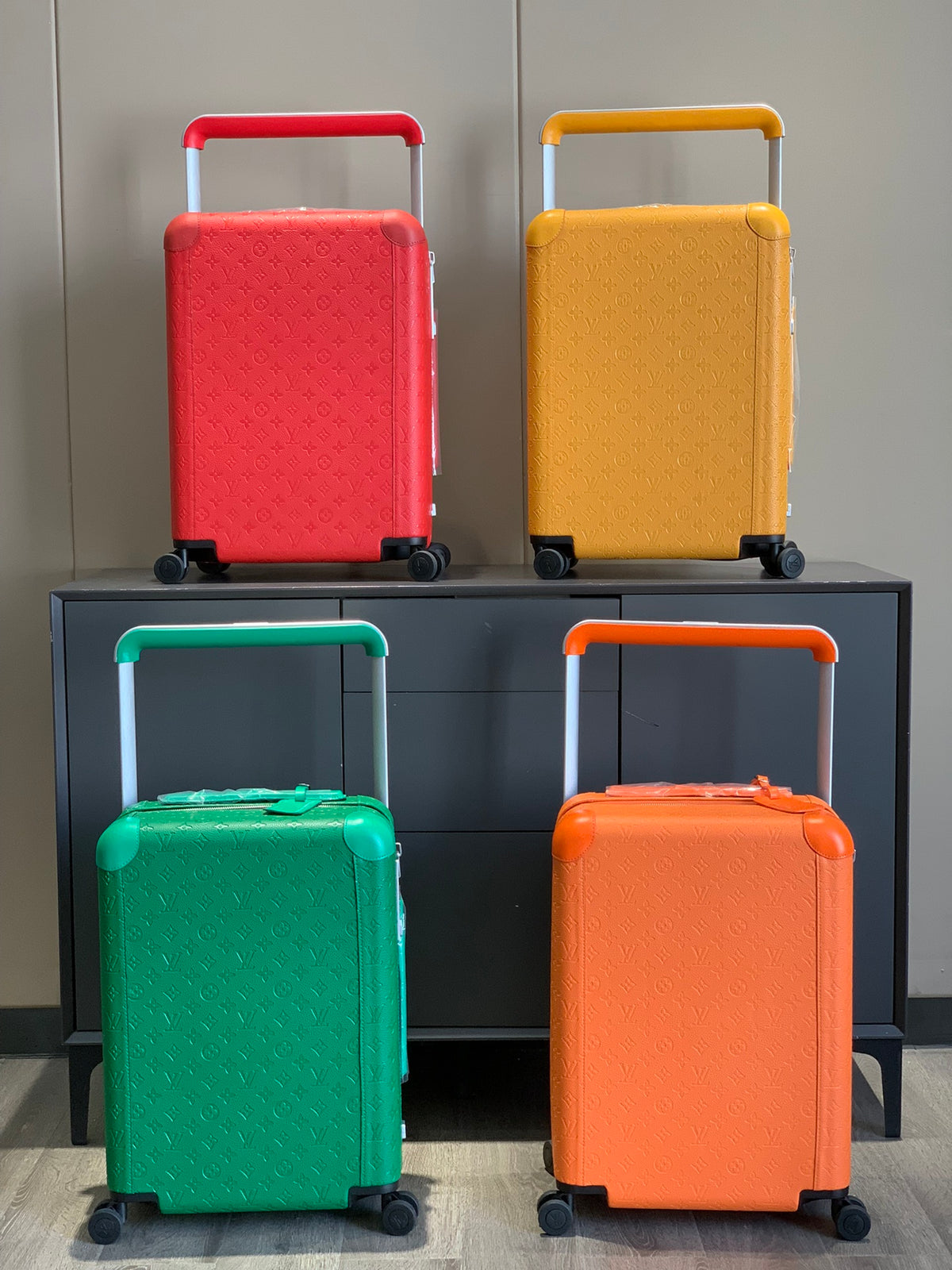 Red Monogram Embossed Hardshell Rolling Suitcase Travel Luggage
