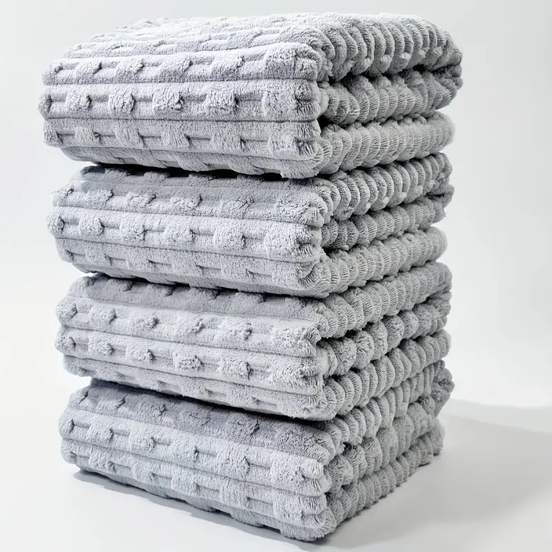 Four Textured Ribbed Towels in Assorted Pastel Colours
