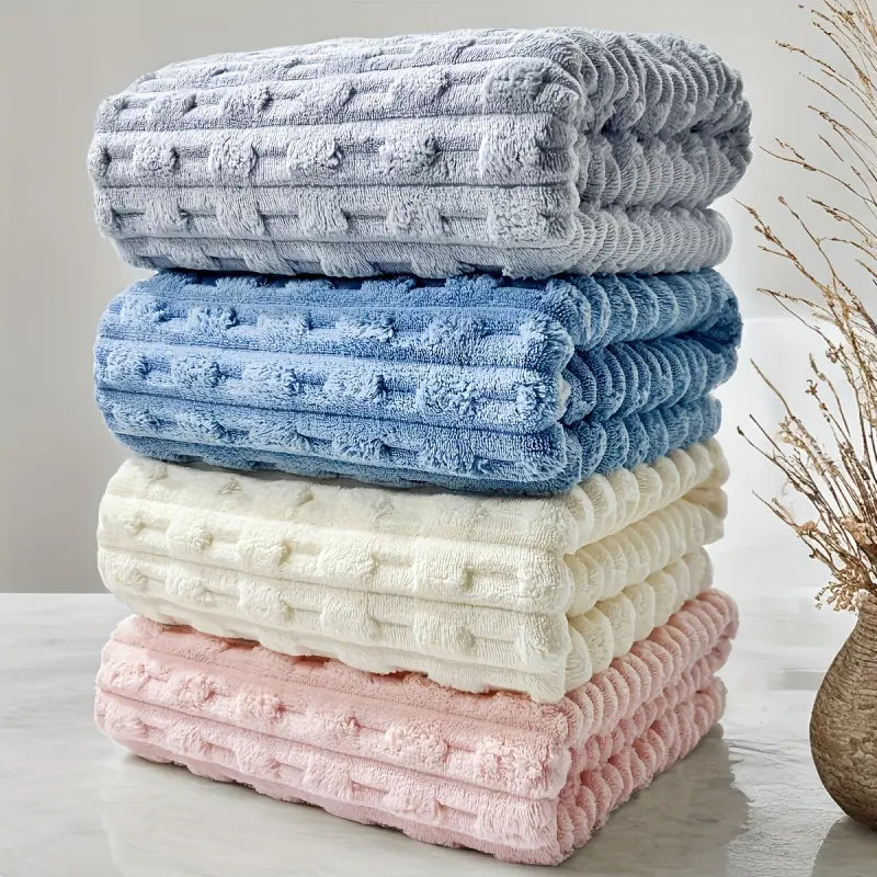 Four Textured Ribbed Towels in Assorted Pastel Colours