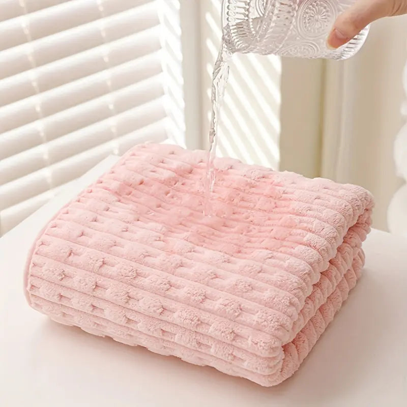 Four Textured Ribbed Towels in Assorted Pastel Colours