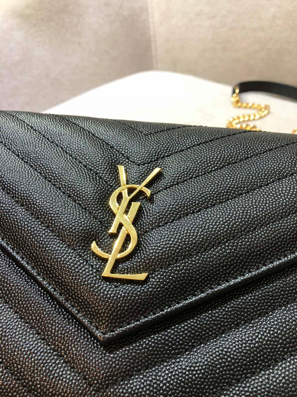 Saint Laurent Cassandre Matelassé Chain Wallet in Grain de Poudre Embossed Leather - Black