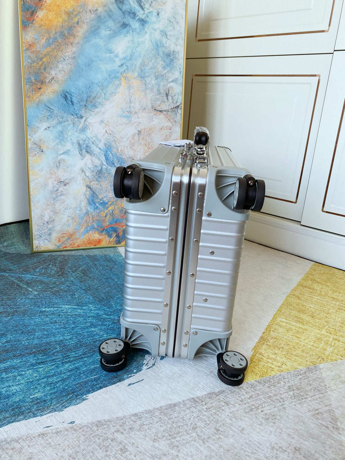 Ribbed Silver Aluminum Carry-On Suitcase with Spinner Wheels
