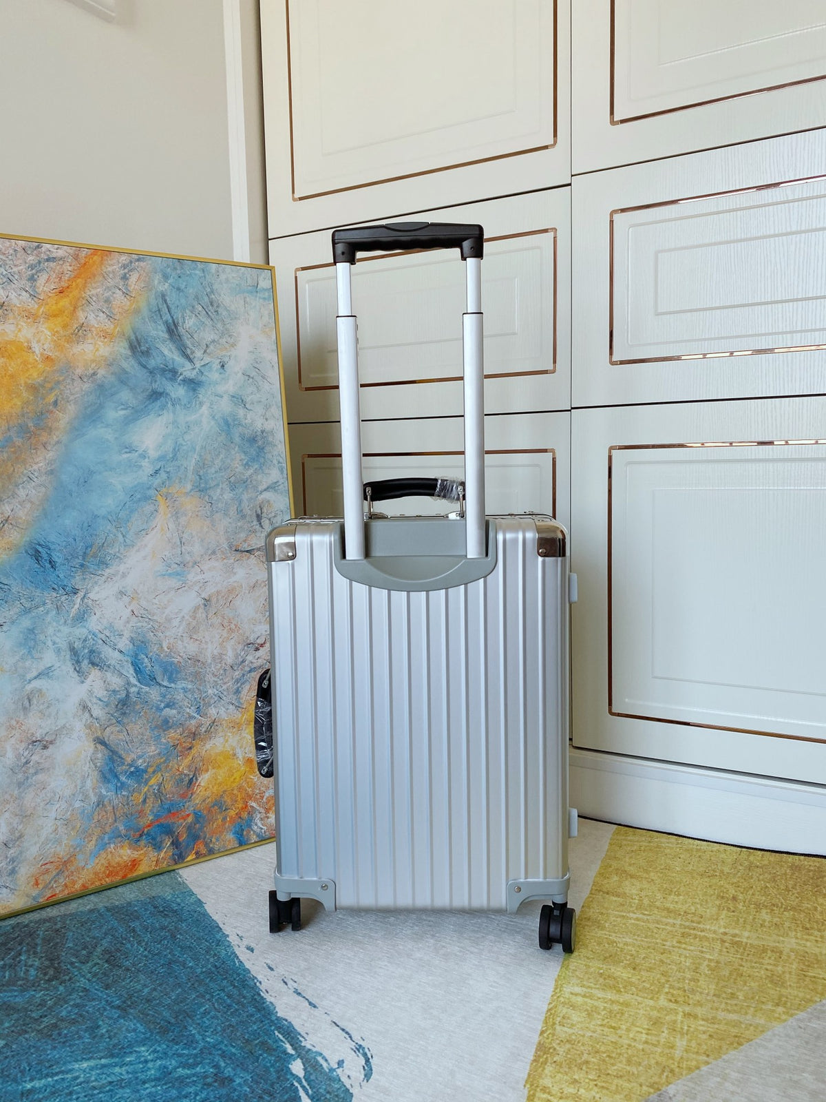 Ribbed Silver Aluminum Carry-On Suitcase with Spinner Wheels