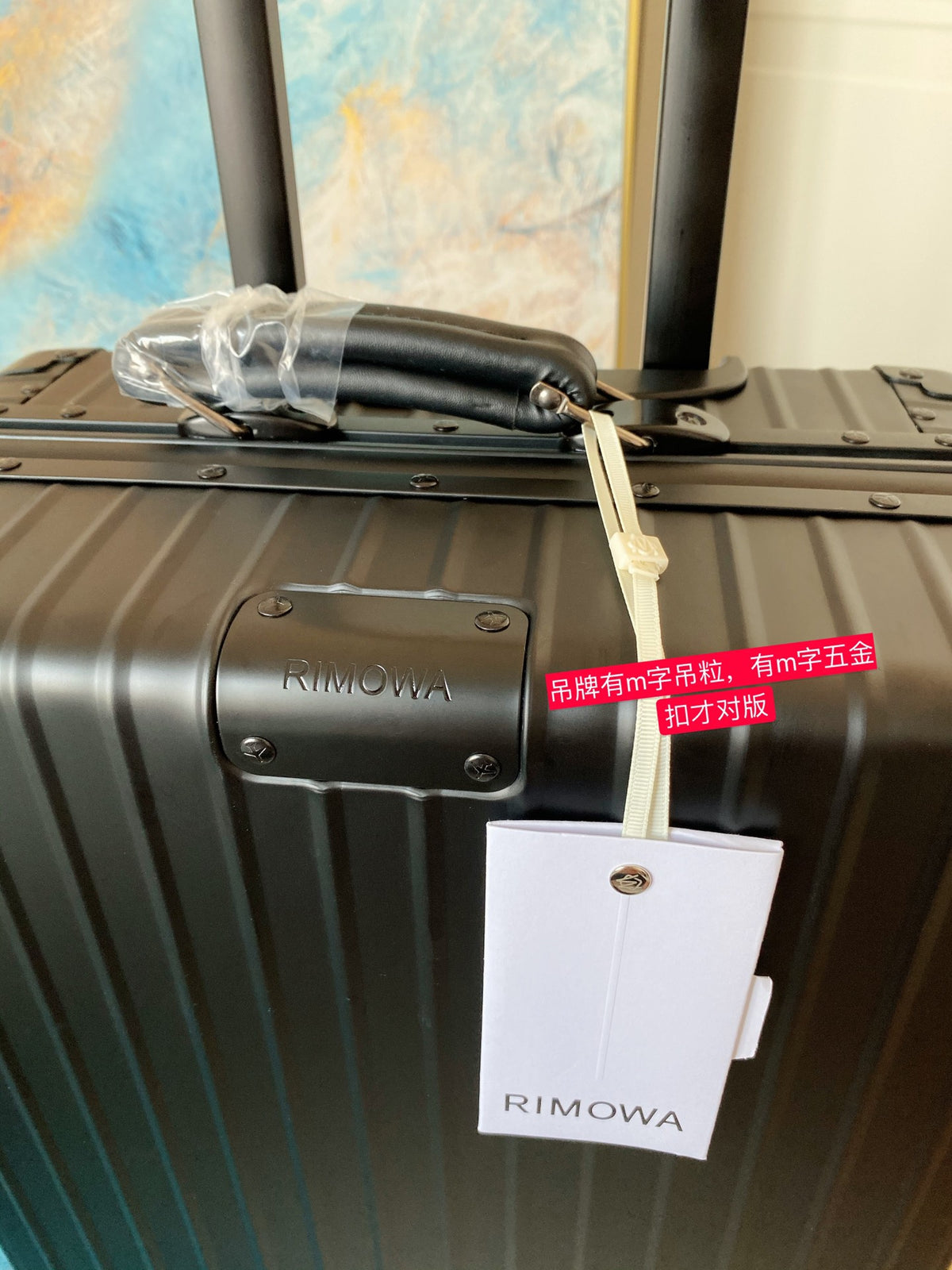 Sleek Matte Black Ribbed Carry-On Hardshell Spinner Suitcase