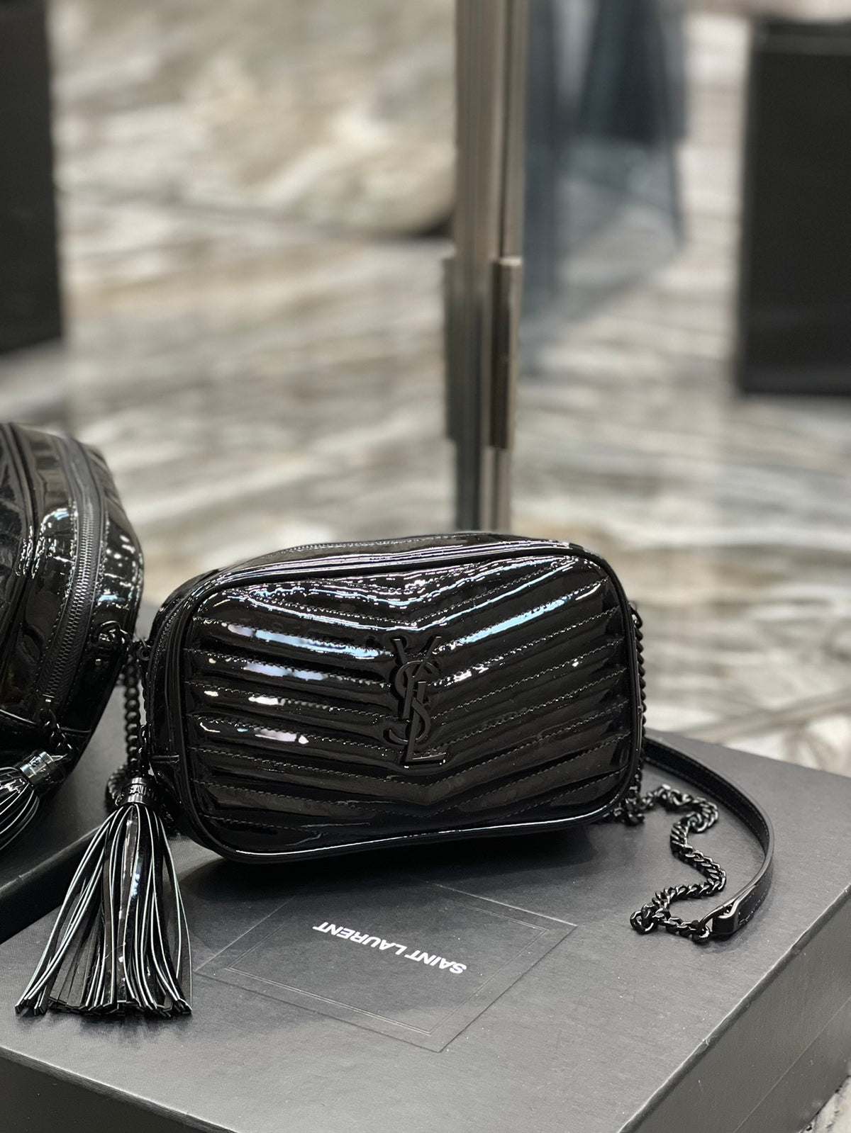 Quilted Black Patent Leather Crossbody Camera Bag with Tassel and Chain Strap