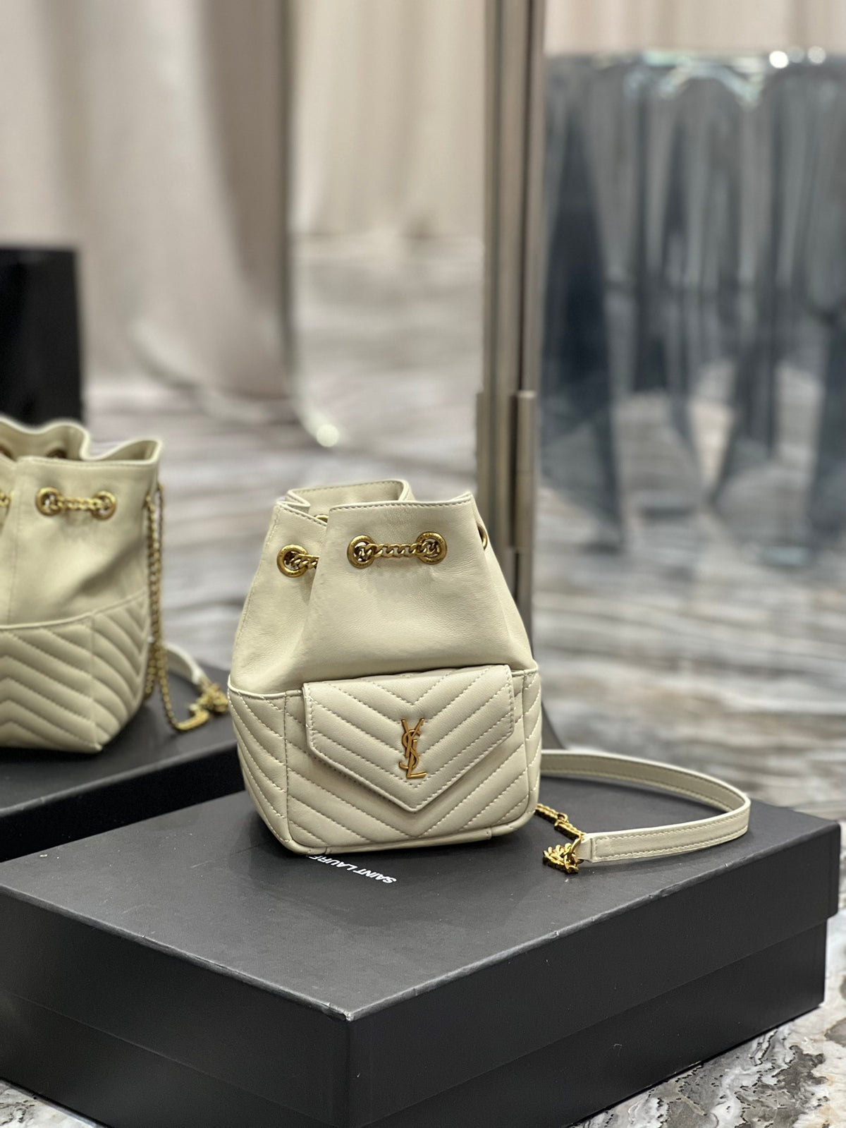 Saint Laurent Joe Mini Bucket Backpack in Quilted Leather - Beige
